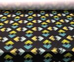 Black Background Green Yellow Ikat Fabric - Image 4