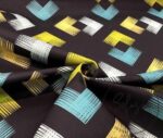 Black Background Green Yellow Ikat Fabric - Image 5