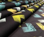 Black Background Green Yellow Ikat Fabric - Image 7