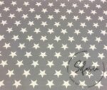 Plain White Starry Fabric on Gray Background