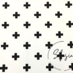 White Fabric with Black Plus Symbol Pattern