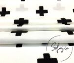 White Fabric with Black Plus Symbol Pattern - Image 5