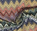Zigzag Patterned Fabric with Vibrant Color Transition - Image 3