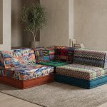 Floor sofa for adults with colorful boho tapestry patterns in modern living room setting
