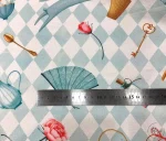 Light-colored fabric with Alice pattern and checkerboard design. - Image 3