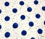 White sofa fabric with blue polka dots.